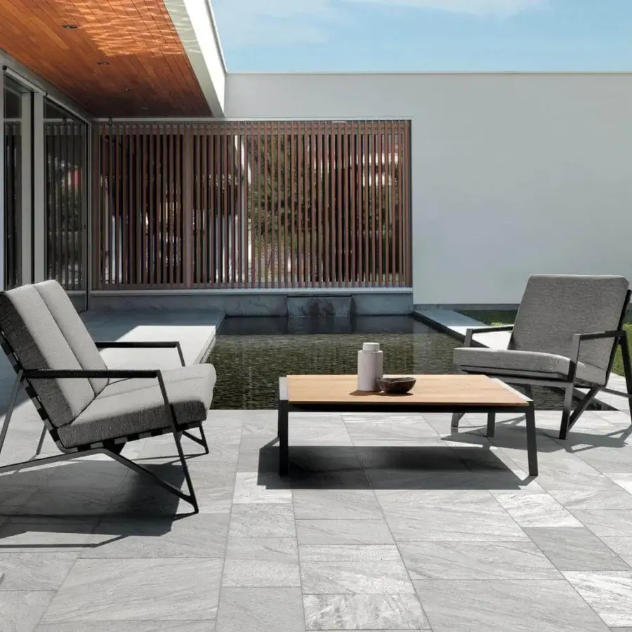Superior Talenti Cottage lounge chair with dark gray aluminum frame and refined gray textile with rope elements