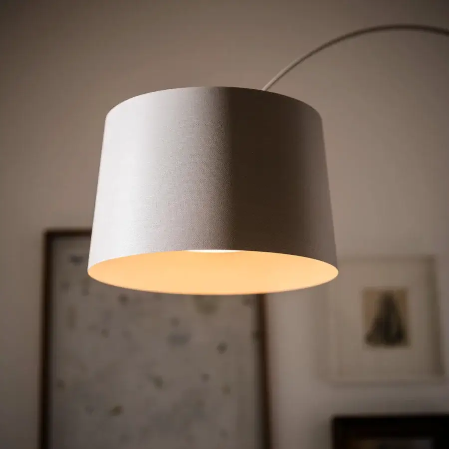 Distinguished Foscarini Twiggy floor lamp crafted in light grey fiberglass with a liquid coated woven texture and metal base