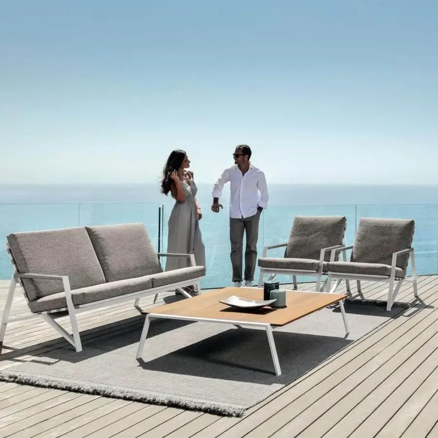Distinguished Talenti Cottage lounge chair with geometric form and weather-resistant gray textile cushions built with an aluminum frame