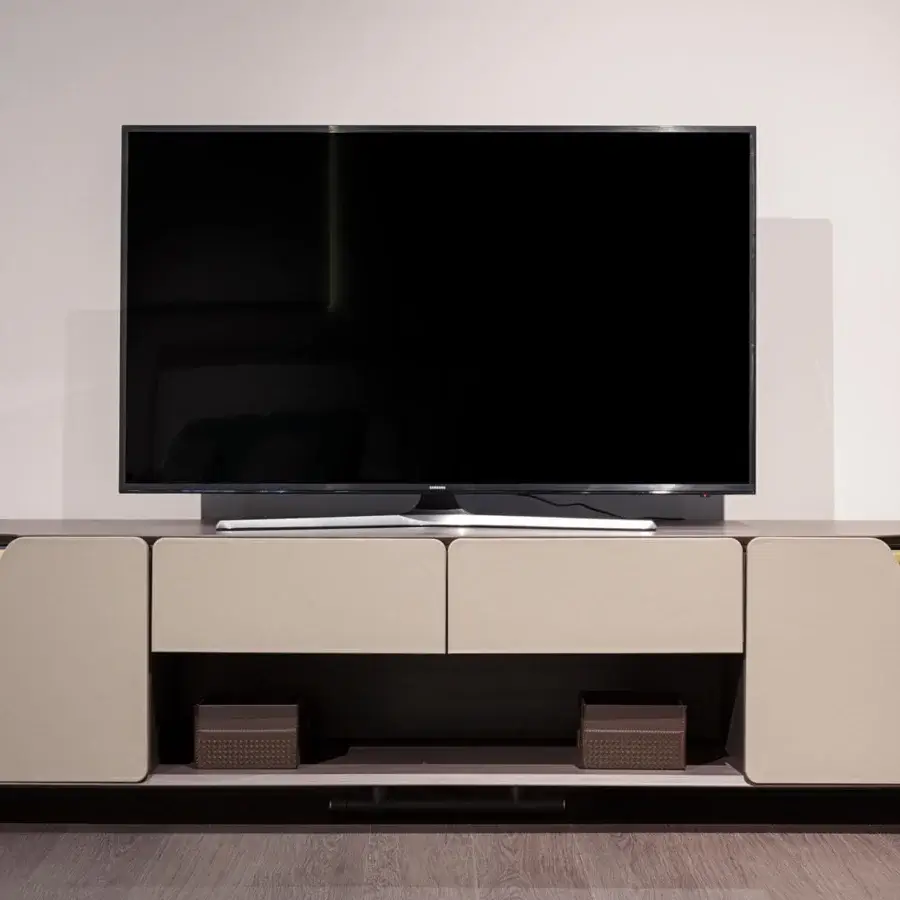 Distinguished Turri Vine TV stand in wood with embedded glass and light beige matte finish, adorned with leather applications and internal LED lighting
