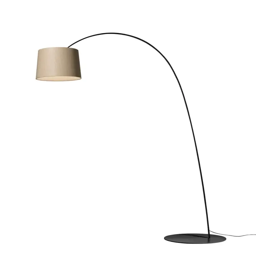 Distinctive Foscarini Twiggy Wood floor lamp with gracefully curved shade built from limed maple oak and fiberglass composite in a black finish