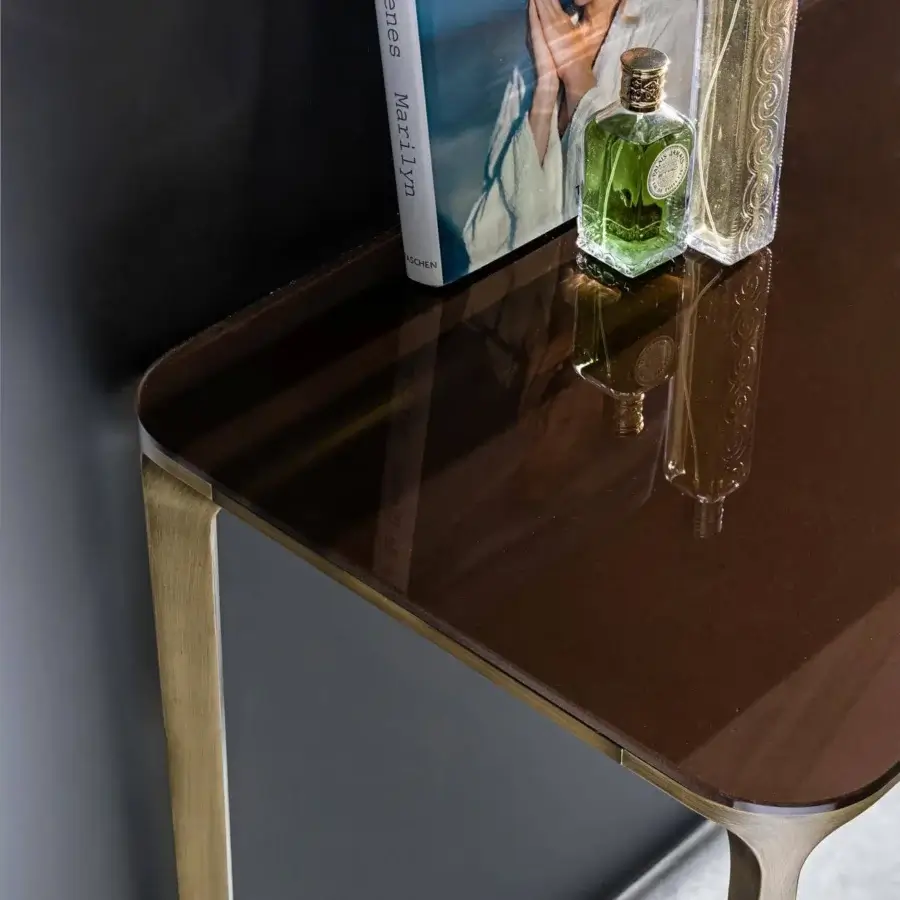 Exceptional Sovet Italia Slim console with dark lacquered glass tabletop and brushed metal frame built with unique leg curvature