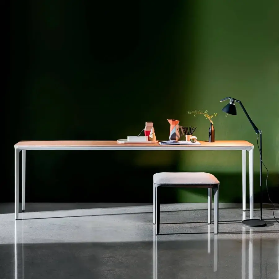 Superior Sovet Italia Slim console crafted in wood with light brown hue and white-finished die-cast aluminum legs