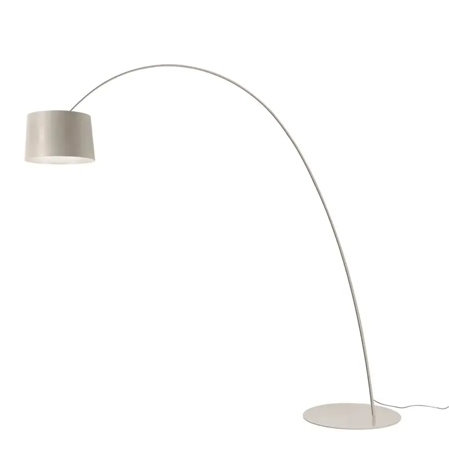 Distinguished Foscarini Twiggy Elle floor lamp crafted with a curved fiberglass composite and metal base in a liquid-coated greige finish