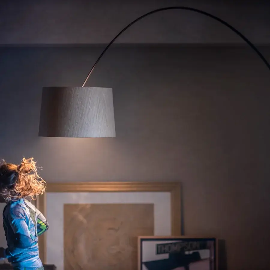 Elegant Foscarini Twiggy Elle floor lamp crafted with overlapping limed maple oak sheets and black fiberglass composite support