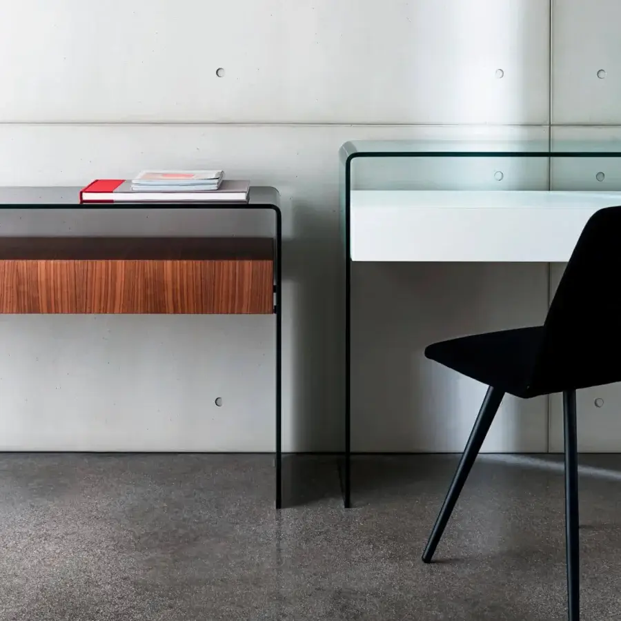 Distinguished Sovet Italia Bridge drawer console built in bent glass with dark-toned wood, embodying minimalist design and sleek structure