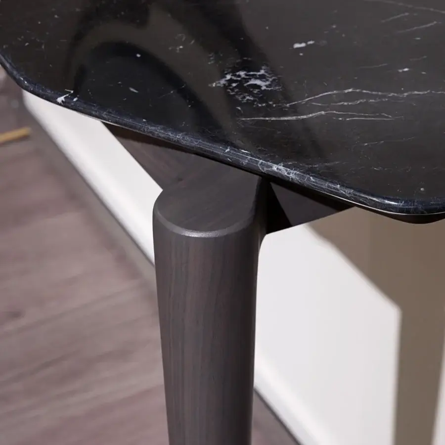 Exclusive Turri Vine console crafted in natural wood with a dark marble top and brushed gold details