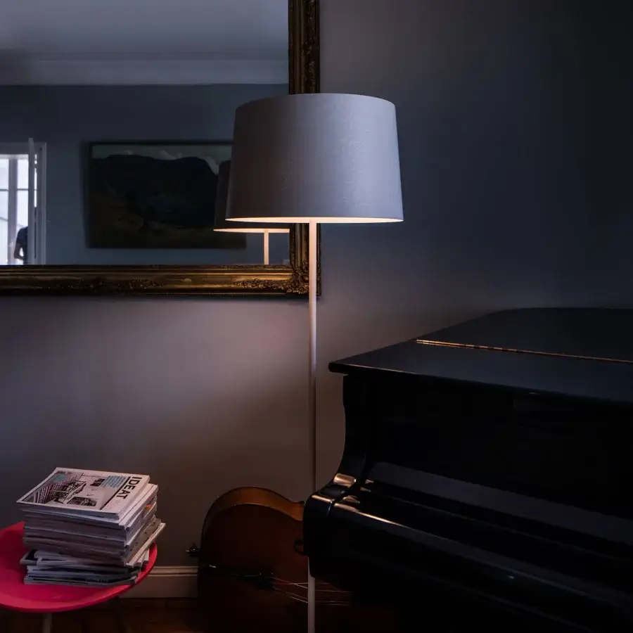 Distinguished Foscarini Twiggy Lettura floor lamp with a light gray fiberglass composite diffuser and epoxy powder coated metal base