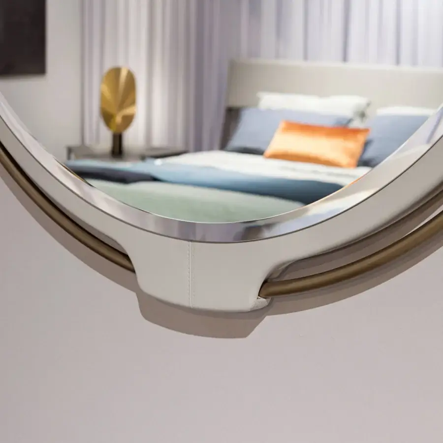 Superior Turri Vine Round mirror with brushed gold metal and light off-white leather, crafted with a smooth matte finish