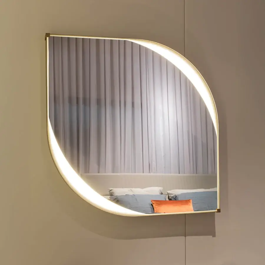 Distinctive Turri Vine Teardrop mirror crafted in brushed gold metal with leather applications and internal LED lighting
