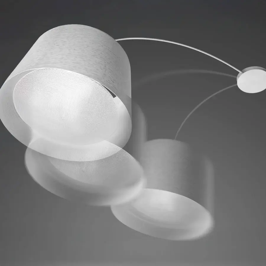 Elegant Foscarini Twiggy Rotating ceiling lamp with a cylindrical shade and curved metal arm in liquid coated fiberglass composite material