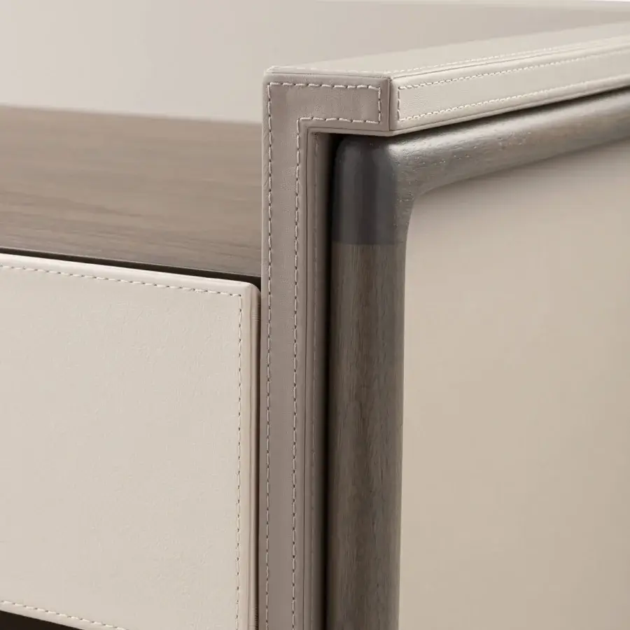 Exceptional Turri Vine nightstand clad in supple cream leather and dark wood exhibiting asymmetrical design