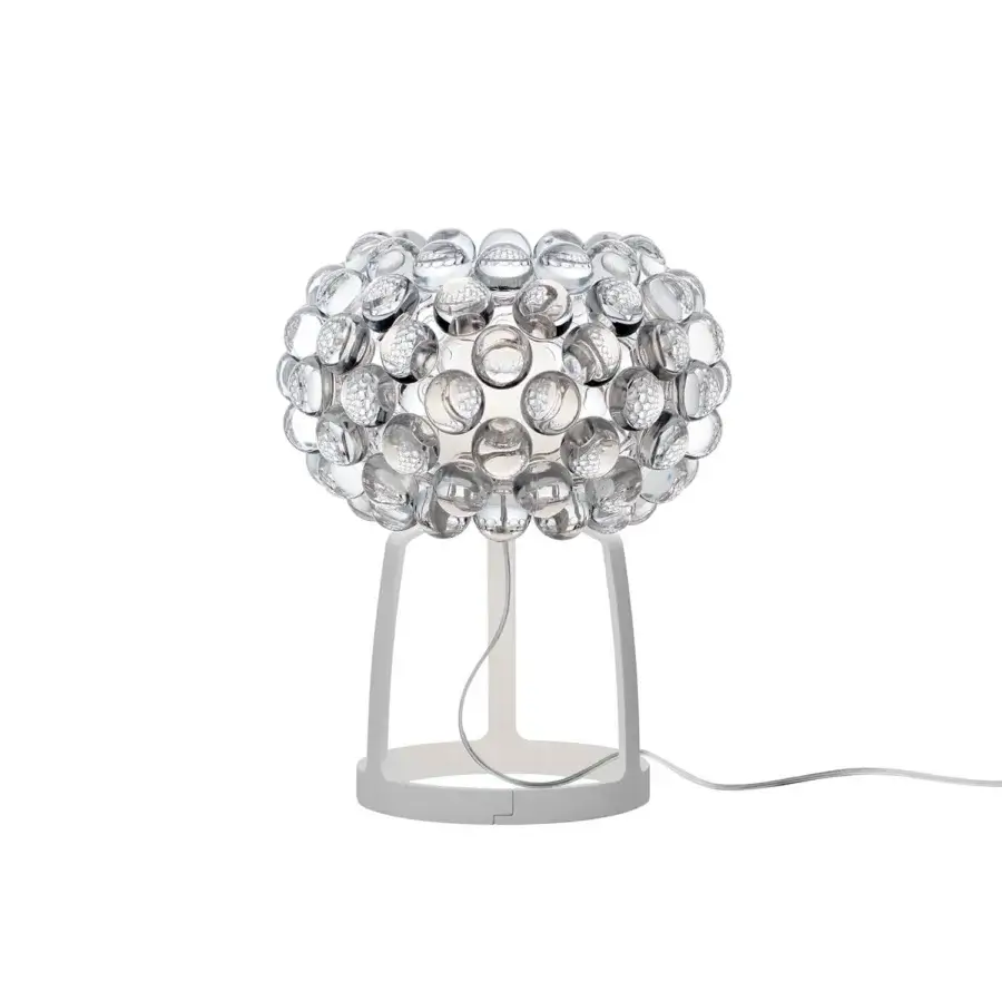 Elegant Foscarini Caboche Plus table lamp with transparent PMMA spheres and light gray powder-coated aluminum base