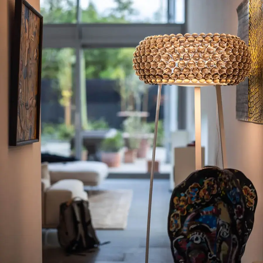 Innovative Foscarini Caboche Plus floor lamp with numerous translucent PMMA spheres affixed to transparent PC arches and powder-coated steel support