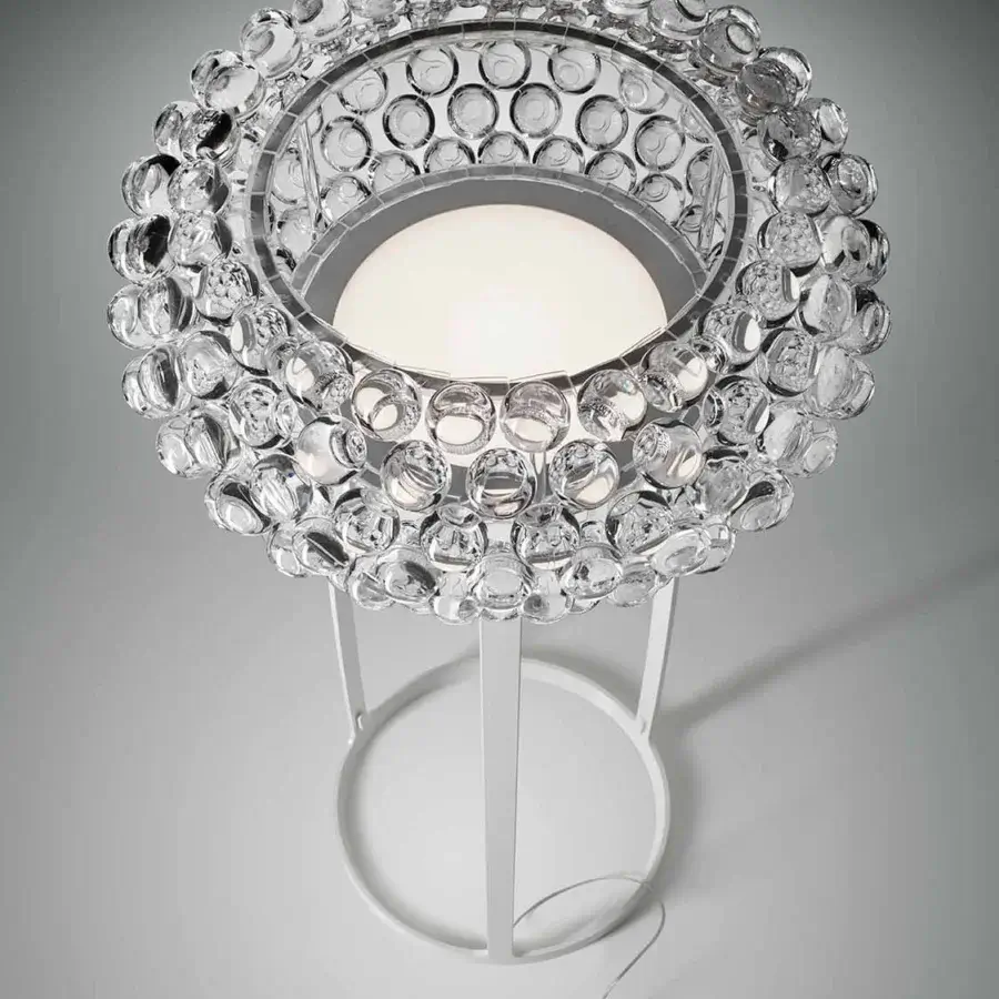 Exceptional Foscarini Caboche Plus floor lamp with a captivating spherical head in transparent PMMA and white epoxy powder coated aluminum construction