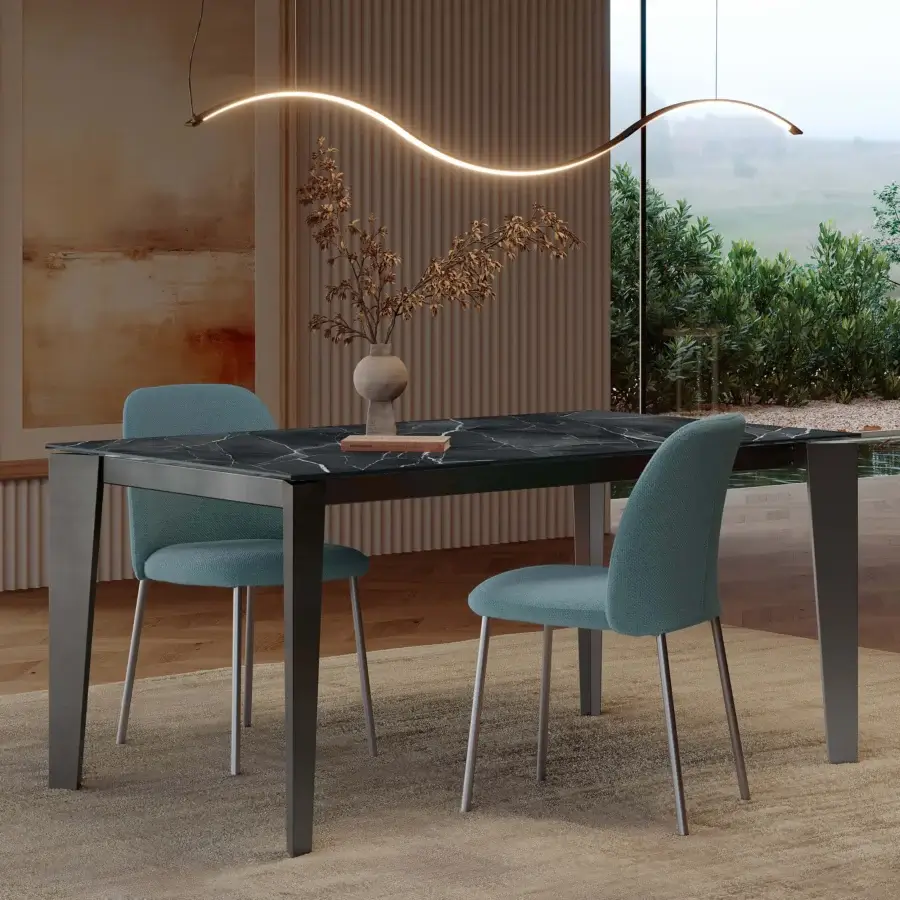 Distinguished Bontempi Infinity suspension lamp with a wave-shaped form emitting a warm yellow glow crafted in Italy