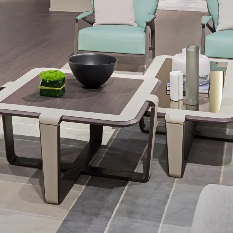 Exceptional Turri Vine coffee table with a dark-toned wooden top, light border and U-shaped legs built with brushed gold accents