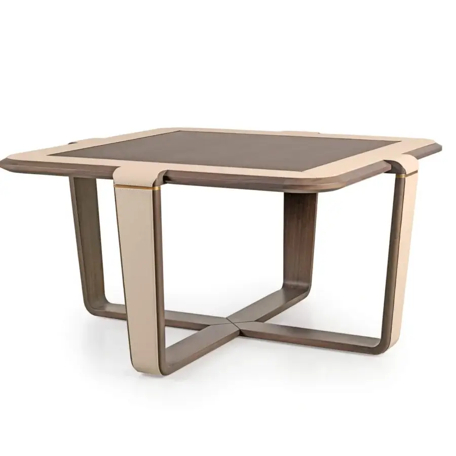 Lavish Turri Vine coffee table with a dark wood top framed in lighter wood and gilded leather accents in a matte finish