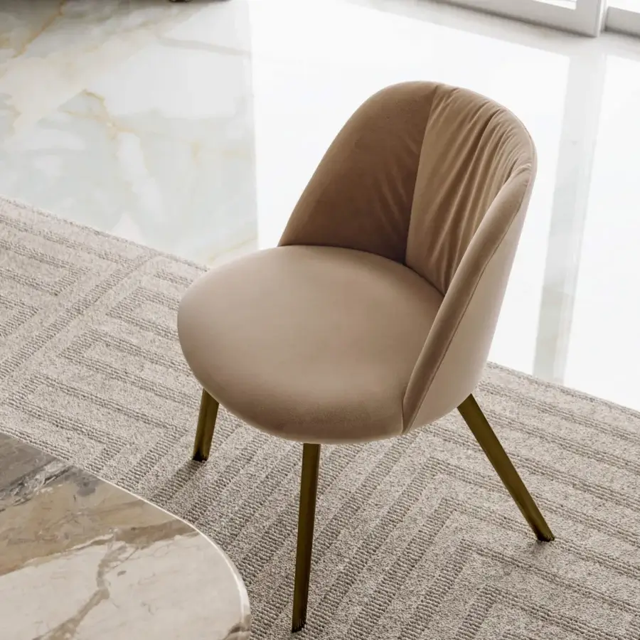 Remarkable Bontempi Agatha chair with light brown upholstery, slender metal legs and curved quilted backrest
