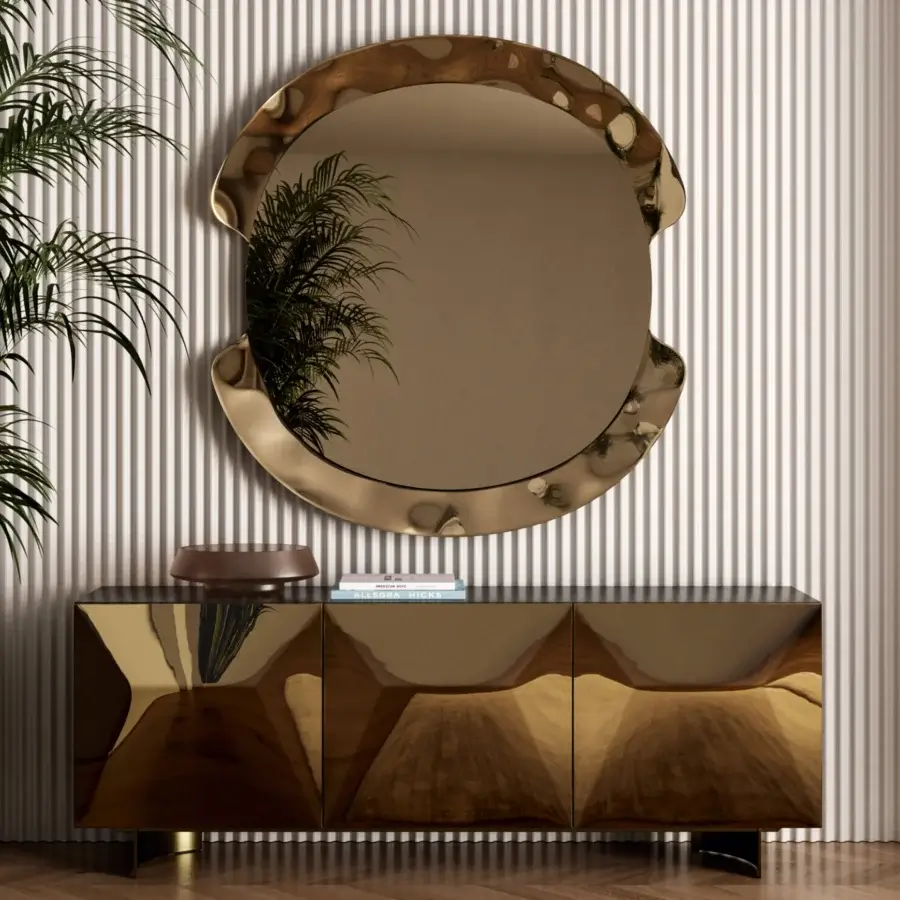 Exceptional Bontempi Peak mirror crafted in Italy with curved mirroring glass and a lustrous gold-toned finish