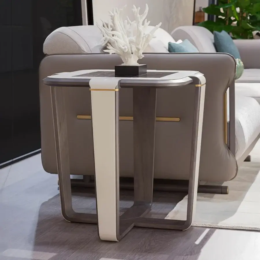 Sophisticated Turri Vine side table with a dark top and matte wood framing, built with a leather-detailed, gold-accented three-leg structure