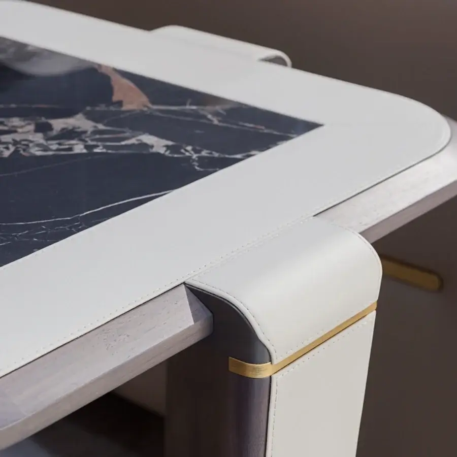 Lavish Turri Vine side table with a dark marble insert and brushed gold embellished wooden base crafted in leather