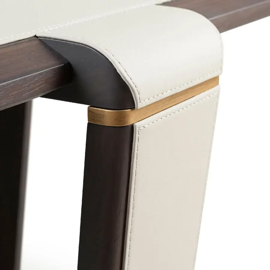Distinguished Turri Vine side table with dark brown wood and off-white leather segments, embellished with brushed gold details and a smooth finish