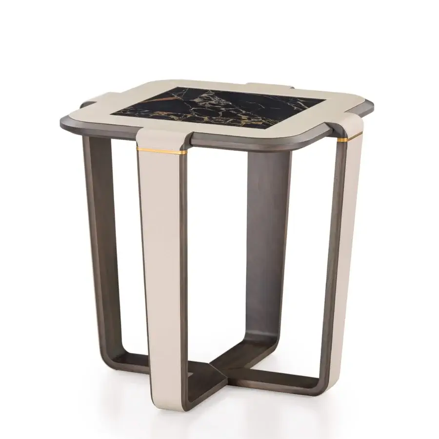 Lavish Turri Vine side table with a cream covering, brushed gold details and dark patterned marble inset in a light frame