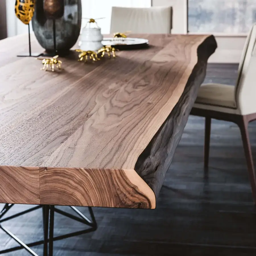 Exceptional Cattelan Italia Gordon Deep Wood table with a smooth, gradient brown live-edge wooden top and dark metal legs