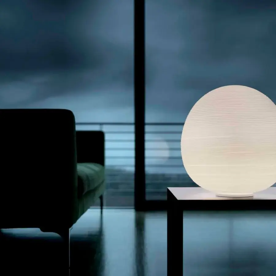 Elegant Foscarini Rituals lamp with ovoid blown glass diffuser and epoxy powder coated metal base