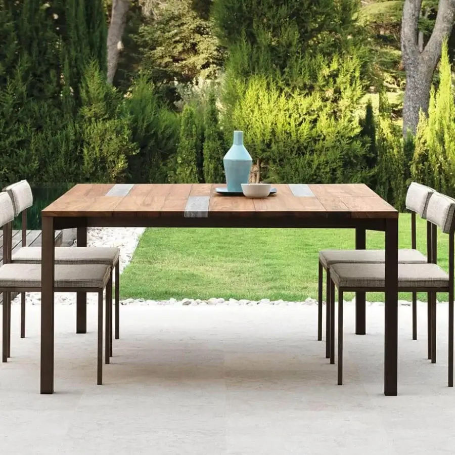 Exceptional Talenti Casilda chair with a geometric stainless steel structure in a matte dark brown finish and light beige upholstery