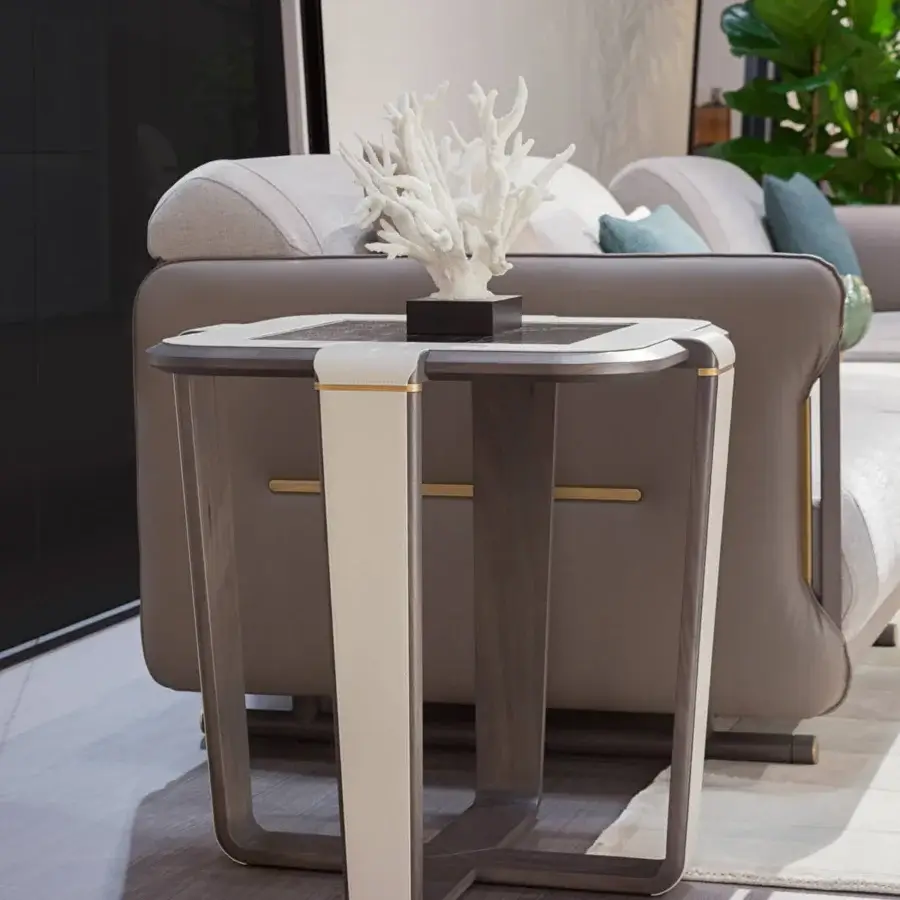 Lavish Turri Vine sectional with light gray textile upholstery and light brown synthetic leather shell crafted with wooden elements and brushed gold accents