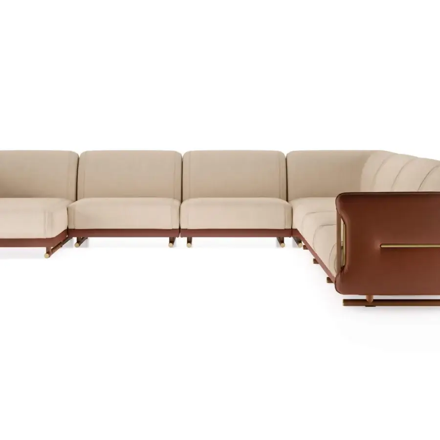 Distinguished Turri Vine sectional with a leather shell contrasted by light beige fabric cushions and brushed gold metal details