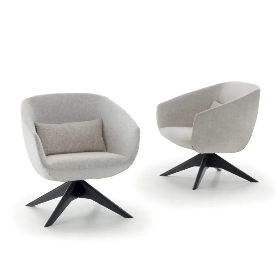 Elegant Pacini & Cappellini Mya lounge chair with a light grey fabric shell and solid ash wood base featuring a dark painted finish