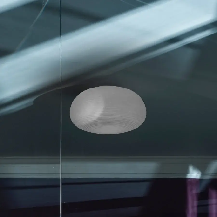 Elegant Foscarini Rituals ceiling lamp in light gray blown glass with textured, striped finish