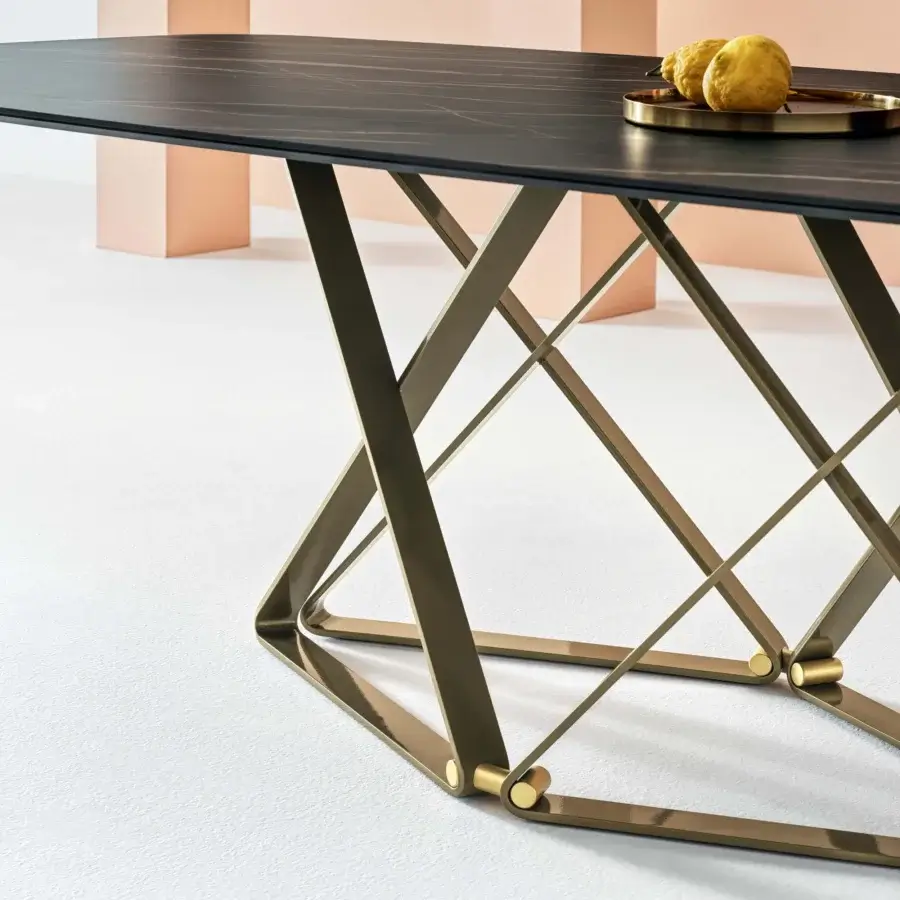 Exclusive Bontempi Delta Barrel table crafted in dark tones with a reflective bronze geometric base