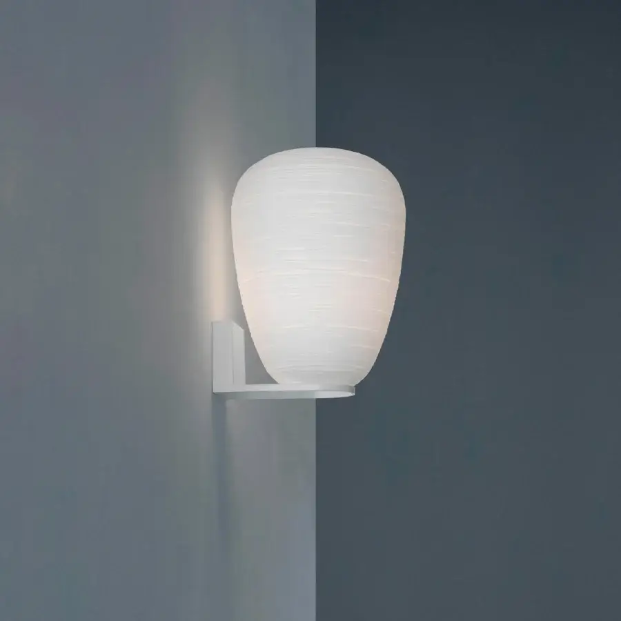 Exceptional Foscarini Rituals wall lamp crafted in blown glass with a horizontally ridged, plaster-like effect and white epoxy powder-coated metal bracket
