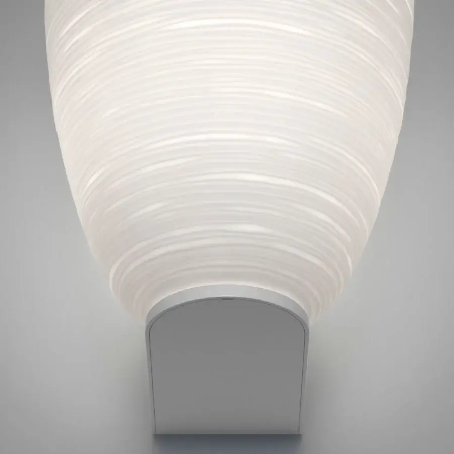Elegant Foscarini Rituals wall lamp with a cocoon-shaped blown glass diffuser and a plaster-like textured white finish