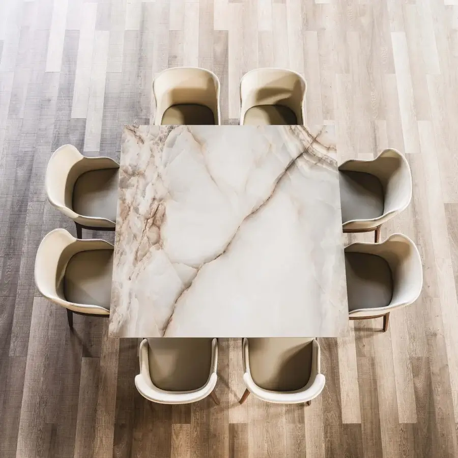 Superior Cattelan Italia Gordon table with swirling Marmi ceramic top and brown accents in a rectangular silhouette