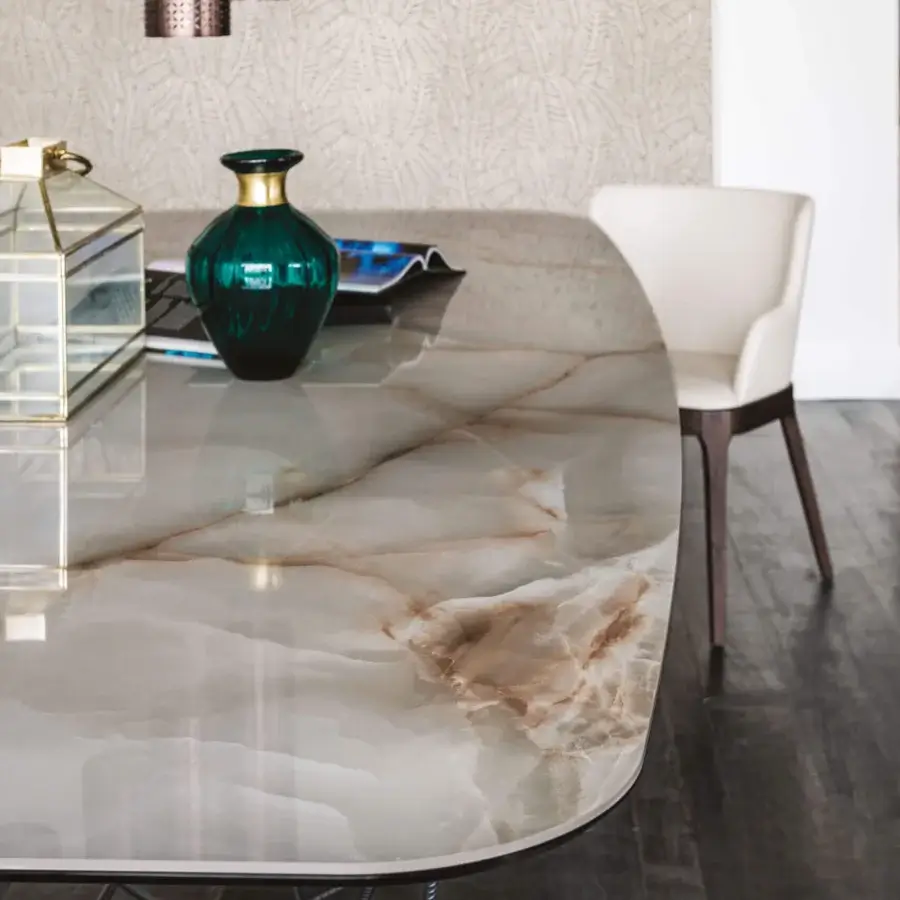 Elegant Cattelan Italia Gordon table with light gray and white Marmi ceramic top and geometric metal base crafted in Italy