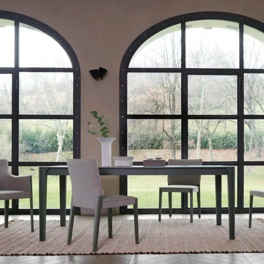 Exceptional Potocco Blossom table crafted in ash wood with a dark finish and minimalist lines
