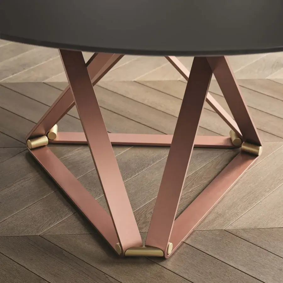 Superior Bontempi Delta round table with dark gray tabletop and geometric base crafted in light-reddish-brown matte metal with golden accents