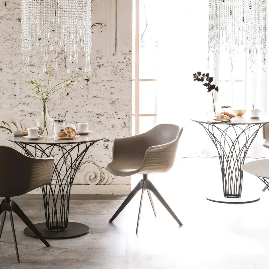 Exceptional Cattelan Italia Nido Keramik bistrot table crafted with light Marmi ceramic and dark lacquered steel base