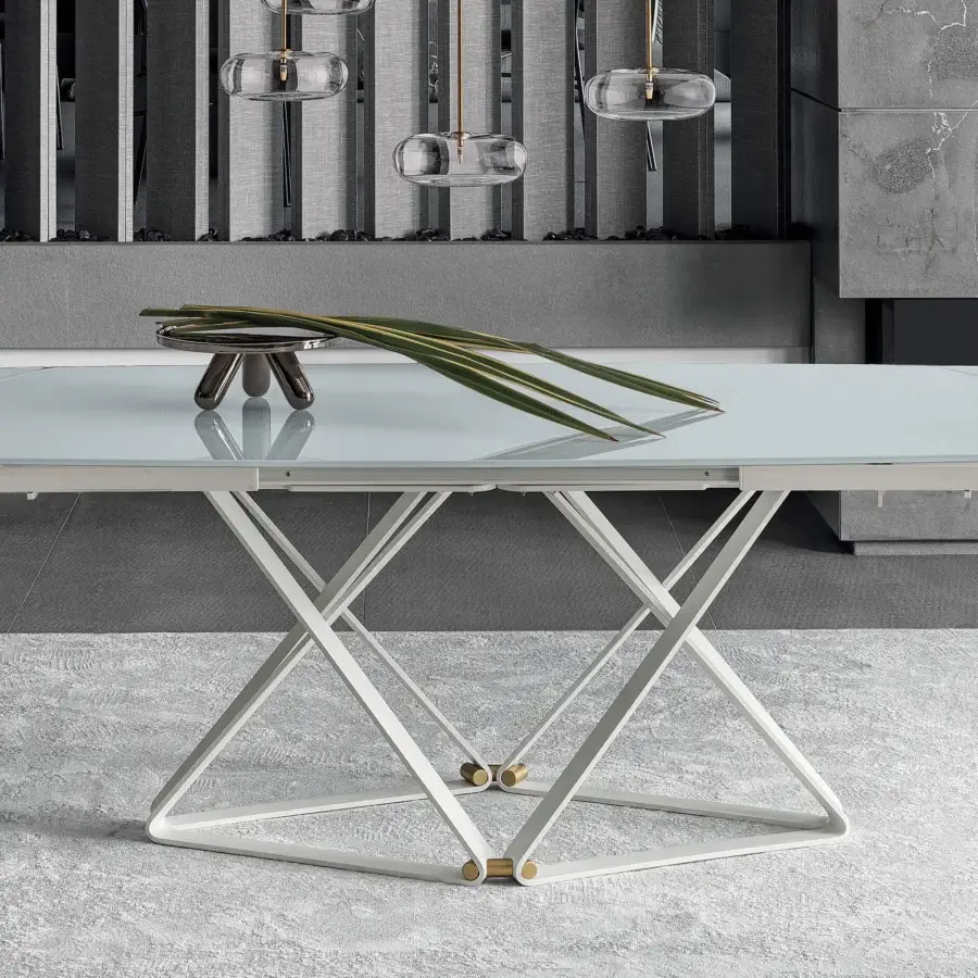 Distinguished Bontempi Delta Barrel table with transparent glass and a striking white metal base accented with golden metallic joints