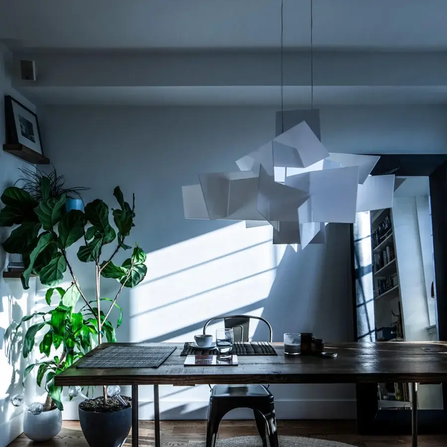 Distinguished Foscarini Big Bang suspension lamp with an irregular geometric silhouette crafted in white aluminum and translucent methacrylate slabs