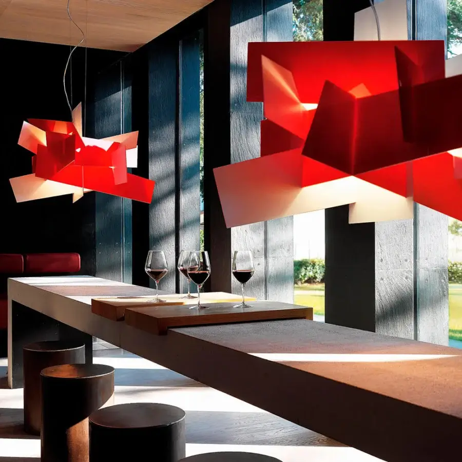 Exceptional Foscarini Big Bang suspension lamp with irregular planes of translucent methacrylate in red and white with a matte finish