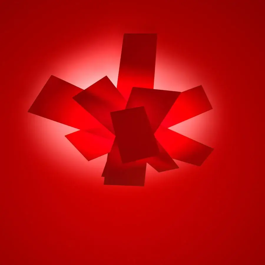 Distinguished Foscarini Big Bang ceiling lamp with intersecting planes of red methacrylate and aluminum color epoxy powder coating