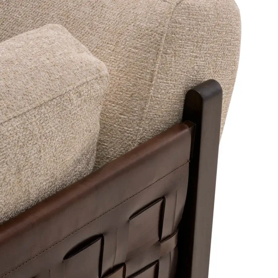 Distinguished Turri Net sofa with dark brown woven leather detail and light beige textured textile cushions in a Eucalyptus wood frame