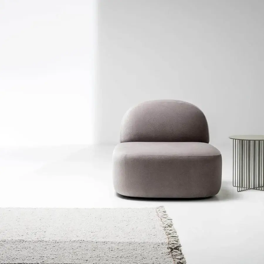 Distinguished LaCividina Guest Lounge Chair with a rounded silhouette upholstered in matte gray textile