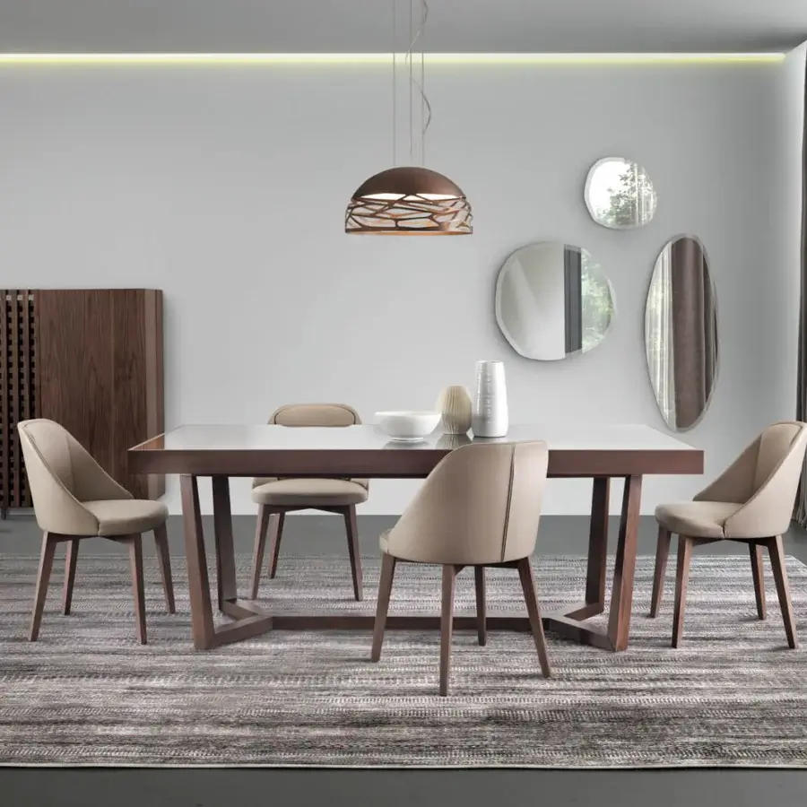 Sophisticated Pacini & Cappellini Amy chair with solid ash wood legs and light beige fabric upholstery